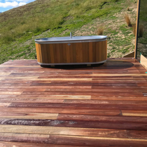 MJS Painters applied non slip clear coat on decking timber at the Lindis Lodge Pods